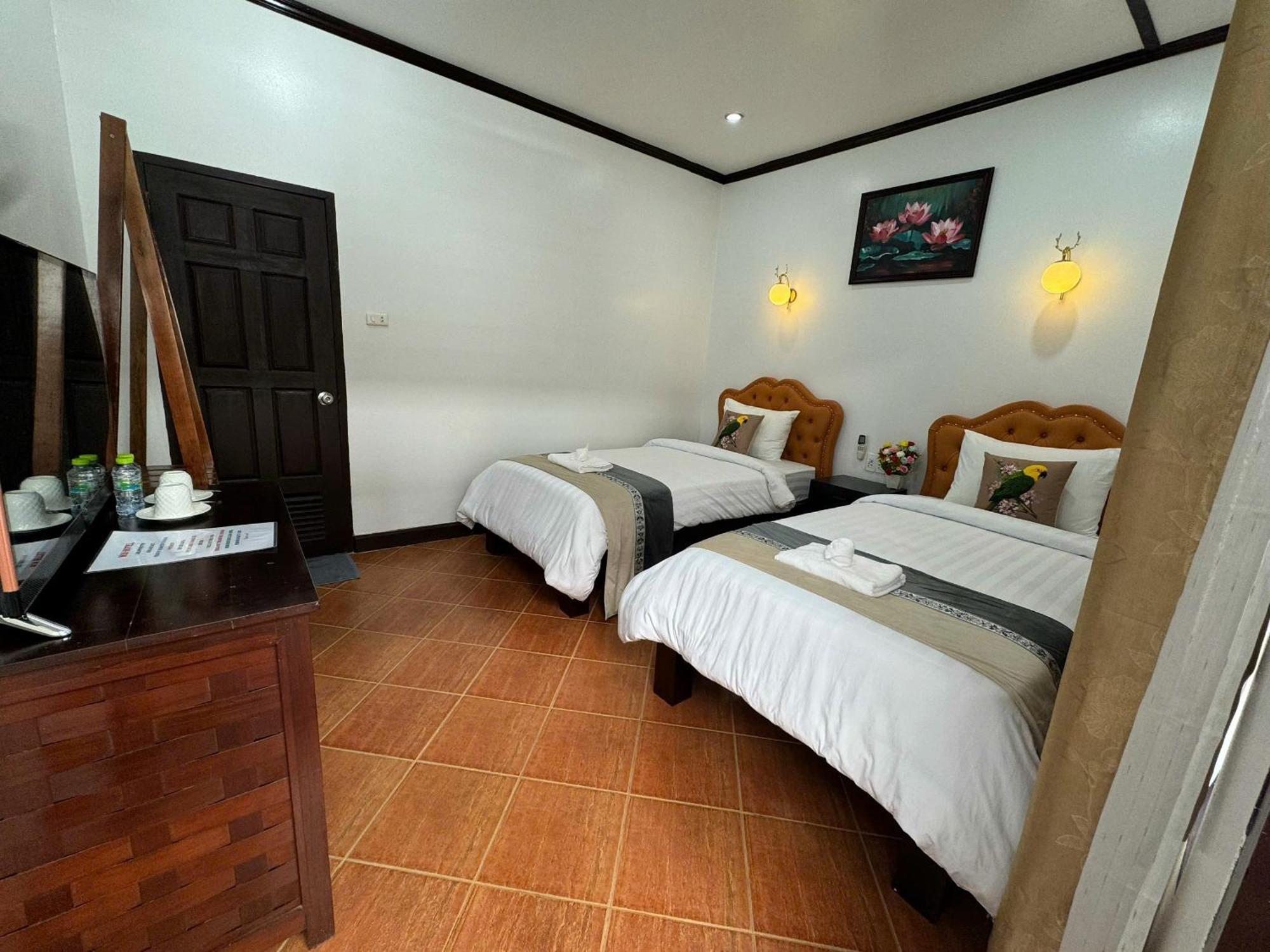 Win Hotel Vang Vieng Rom bilde